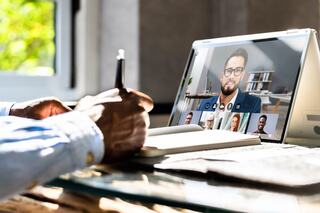 An executive working remotely.