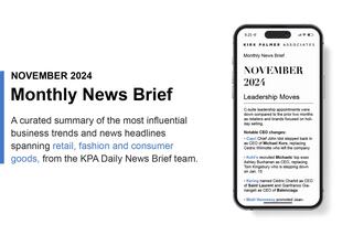 A phone displaying the KPA Monthly News Brief for November